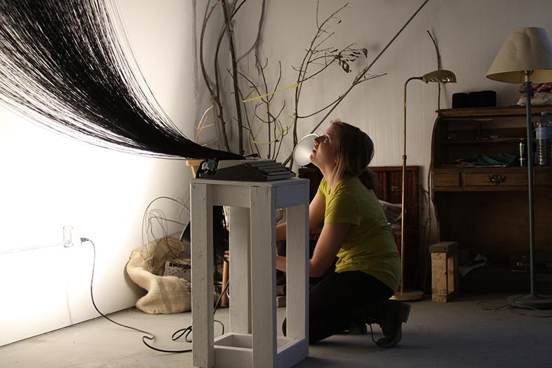 Student working on an art installation